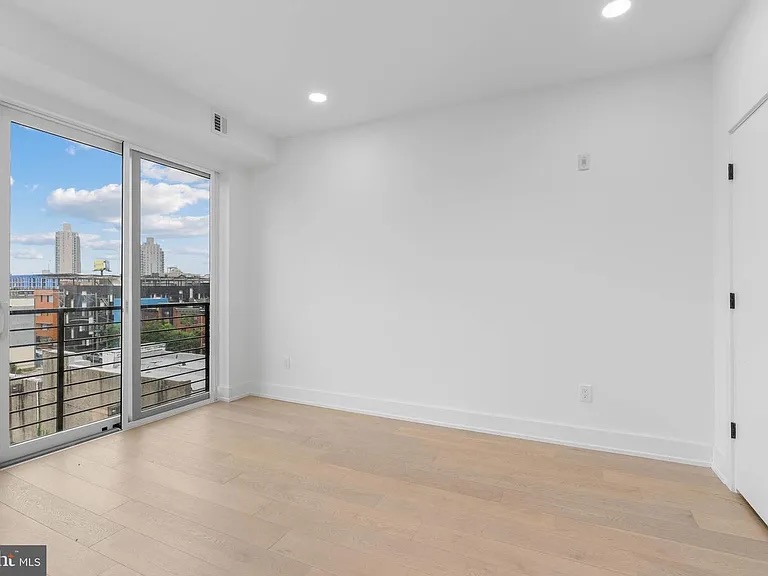 Sleek Luxury STR with Skyline Views & Rooftop Access photo 3