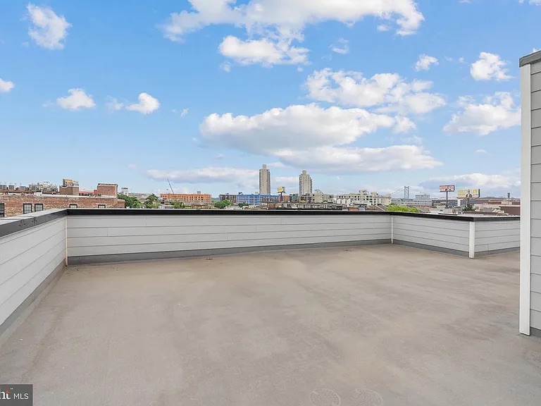 Sleek Luxury STR with Skyline Views & Rooftop Access photo 6